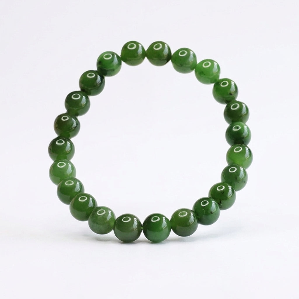 Bracelet circulaire en perles de jadéite naturelle sur fond blanc - 6mm