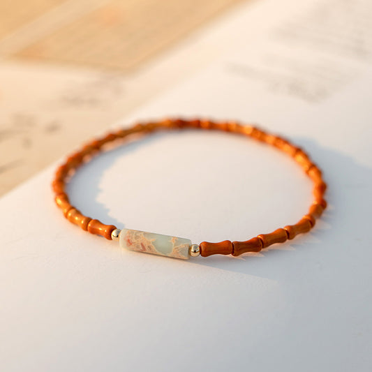 Bracelet bois noyau d’olive et pierre naturelle